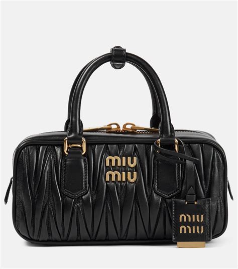 miu miu black patent bag|michael miu.